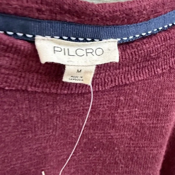 NWT new medium Anthropologie pilcro ruffled raglan thermal long sleeve top plum